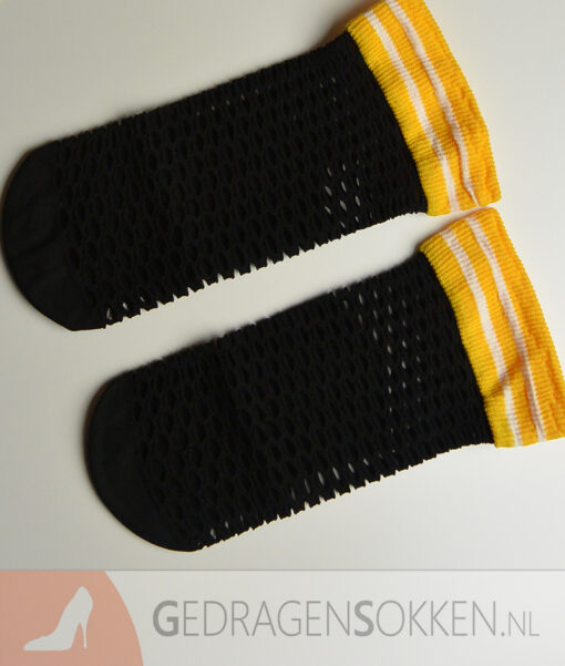 Gedragen fishnet pantysokken