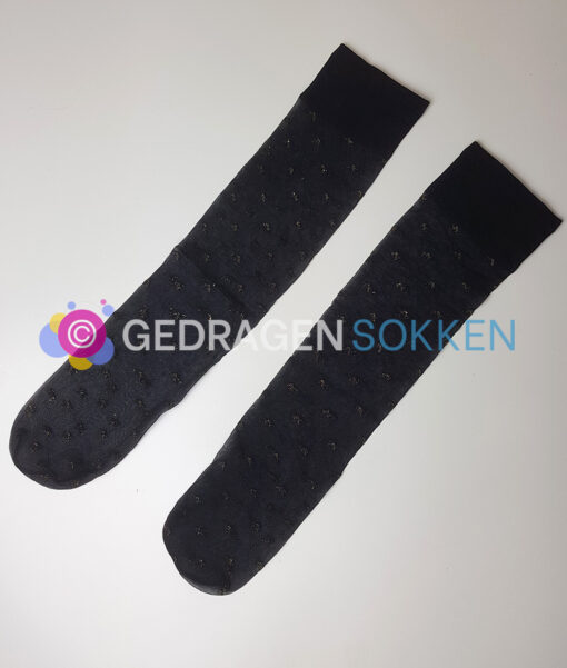 Gedragen pantykousen met gouden sterretjes