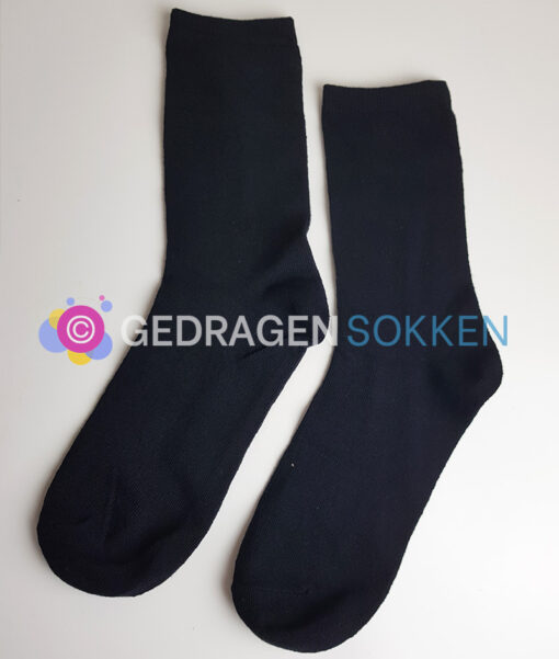 Gedragen sokken zwart